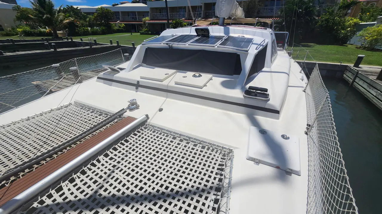 The bow nets and foredeck seen from above at the marina